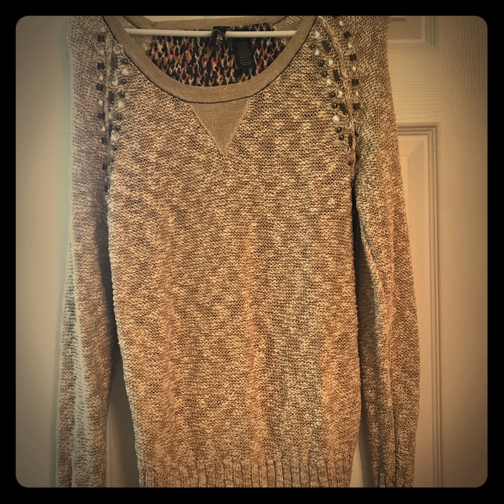 Buckle sweater. Size small. Only worn a few times.